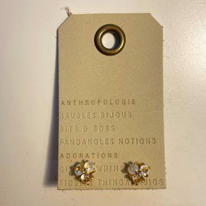 Gold and white stud earrings